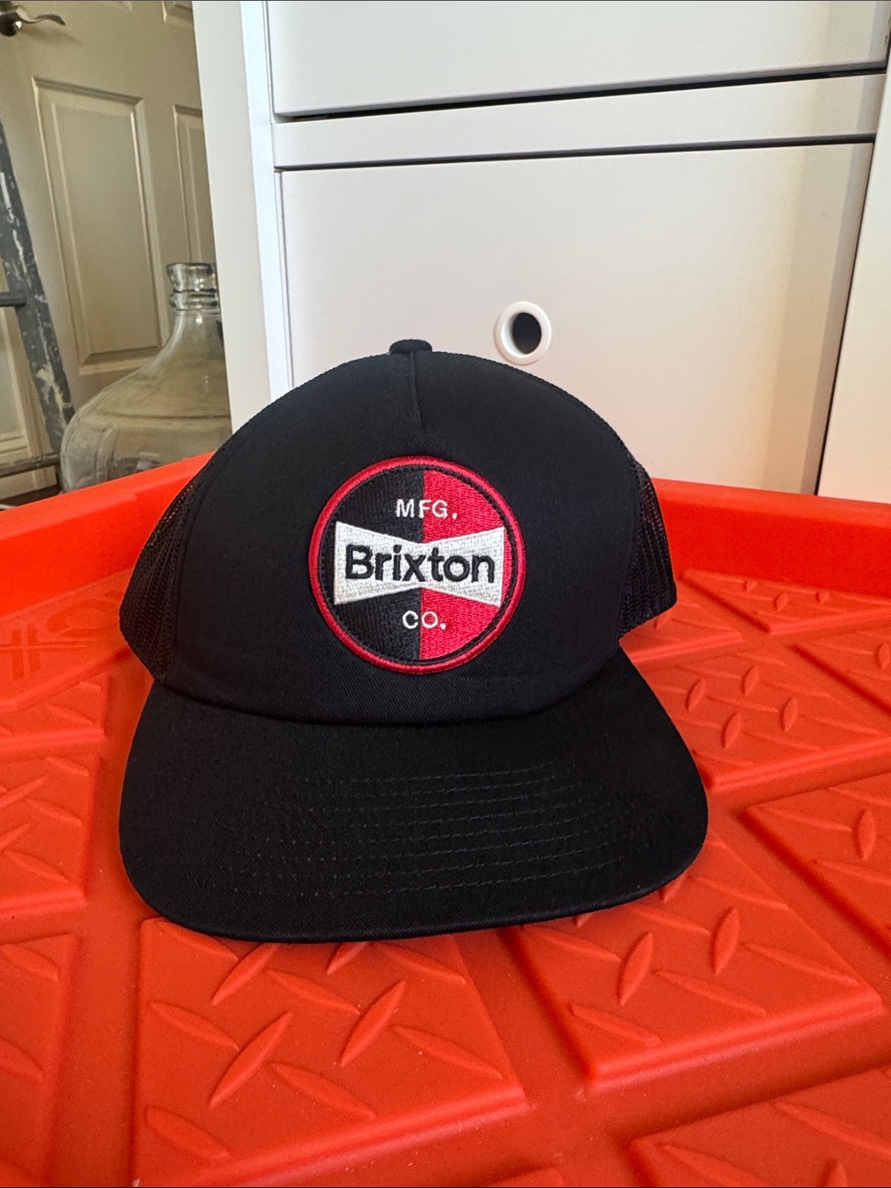 Brixton Black Hat with Red & White Logo Patch